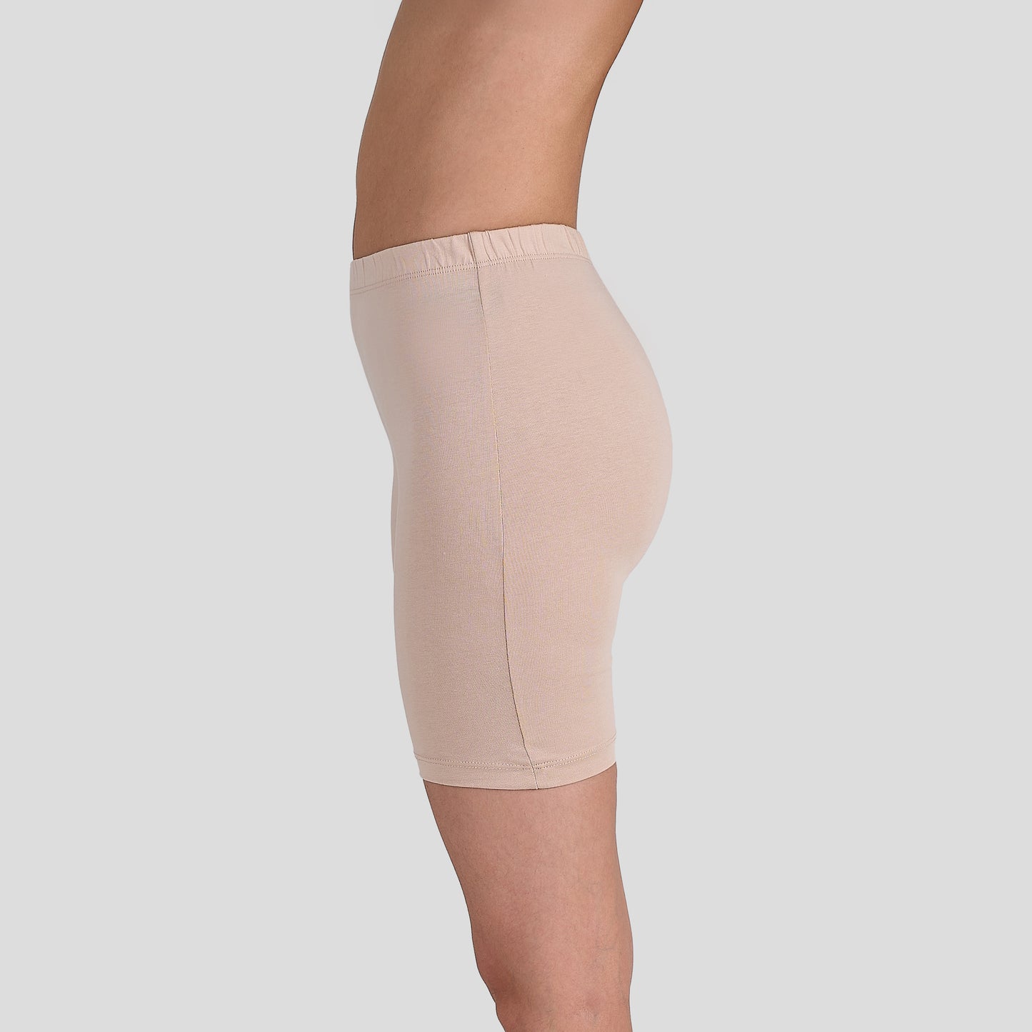 Dice Beige shapewear shorts worn by a person on a light gray background