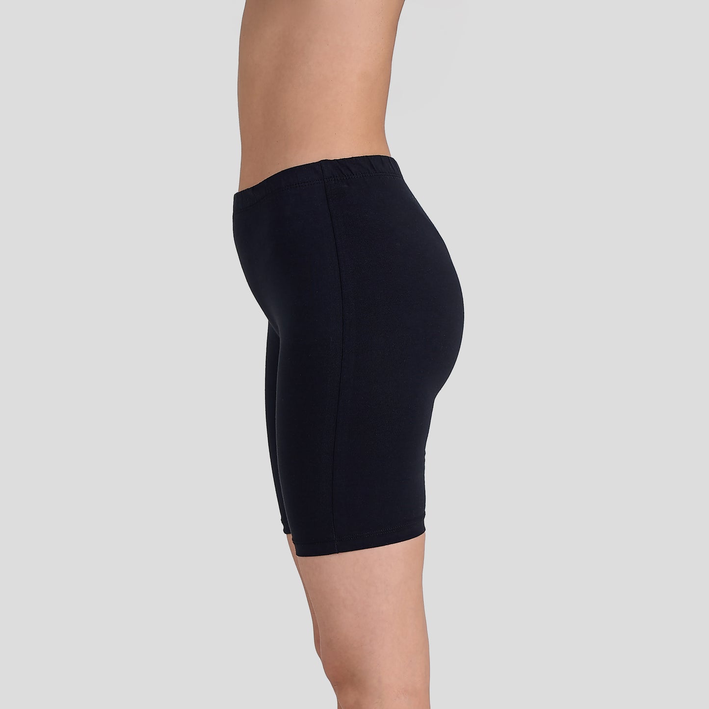 Dice Black biker shorts worn by a person on a light gray background