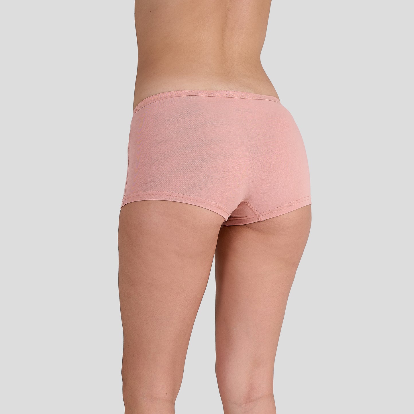 Women Dice pink underwear on a plain background
