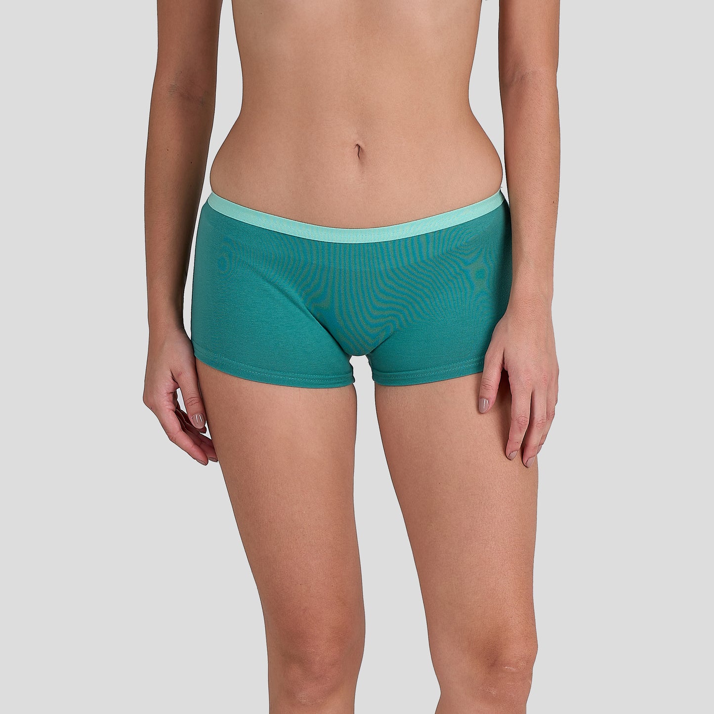 Dice Teal underwear on a plain background