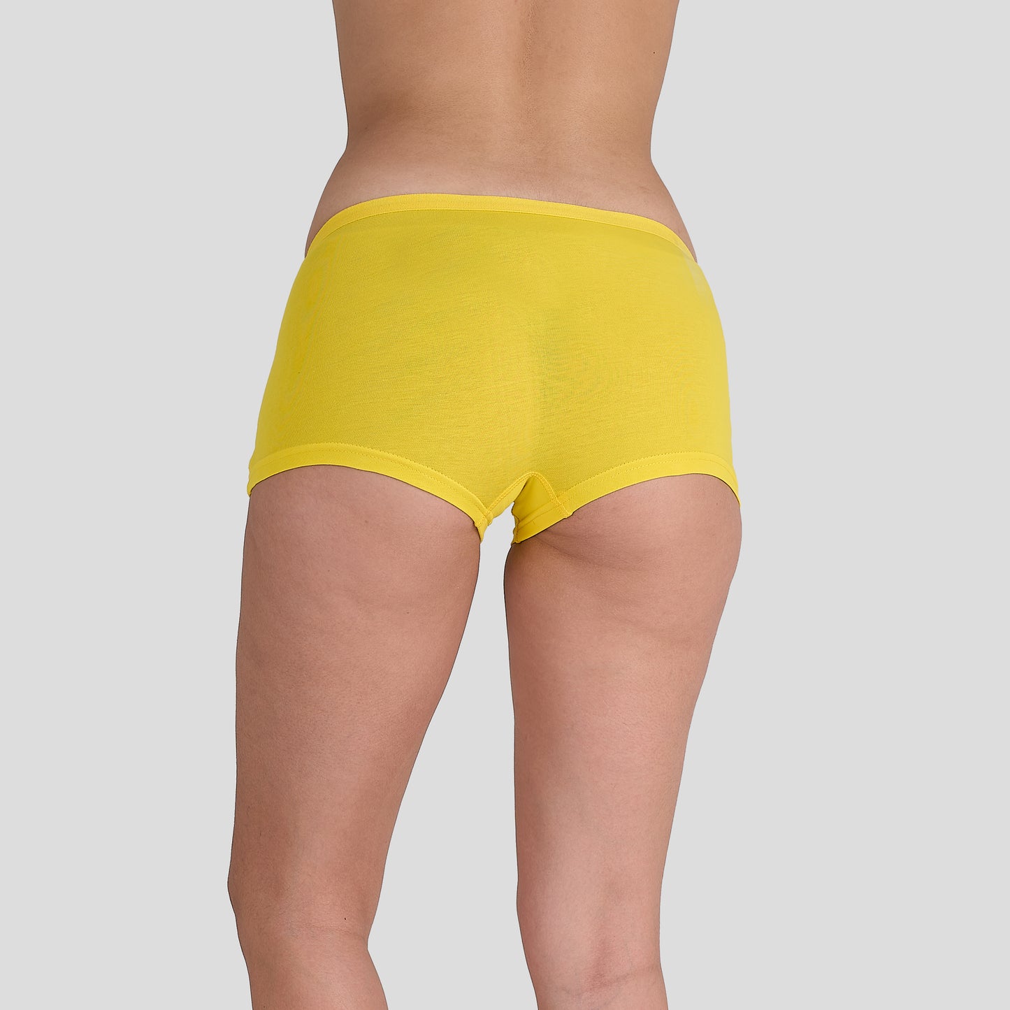Yellow Dice women underwear on a plain background