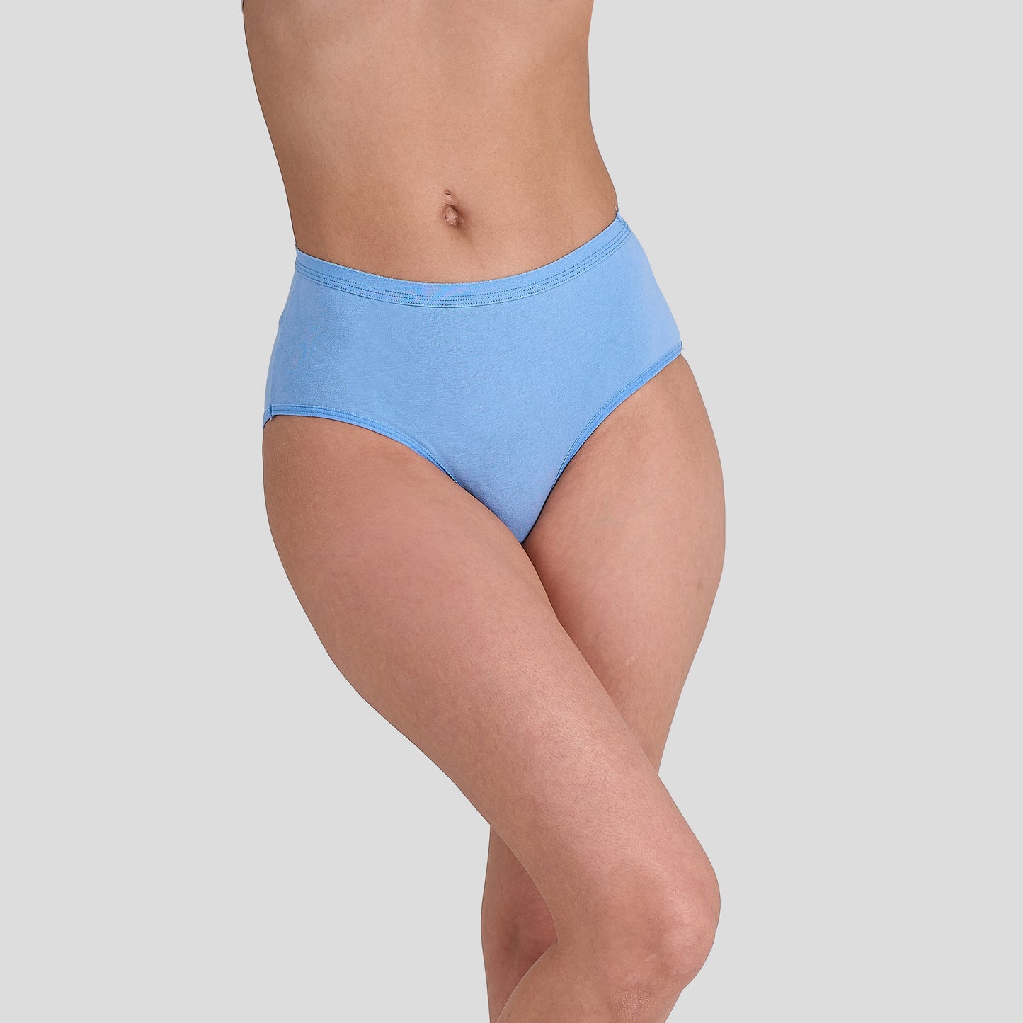 Dice Light blue underwear worn by a person on a gray background