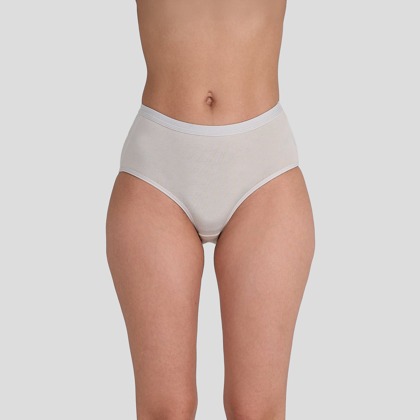 Dice Beige underwear worn by a person on a plain background