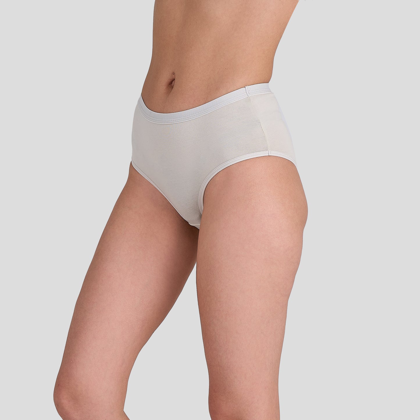 Dice White underwear worn by a person on a light gray background