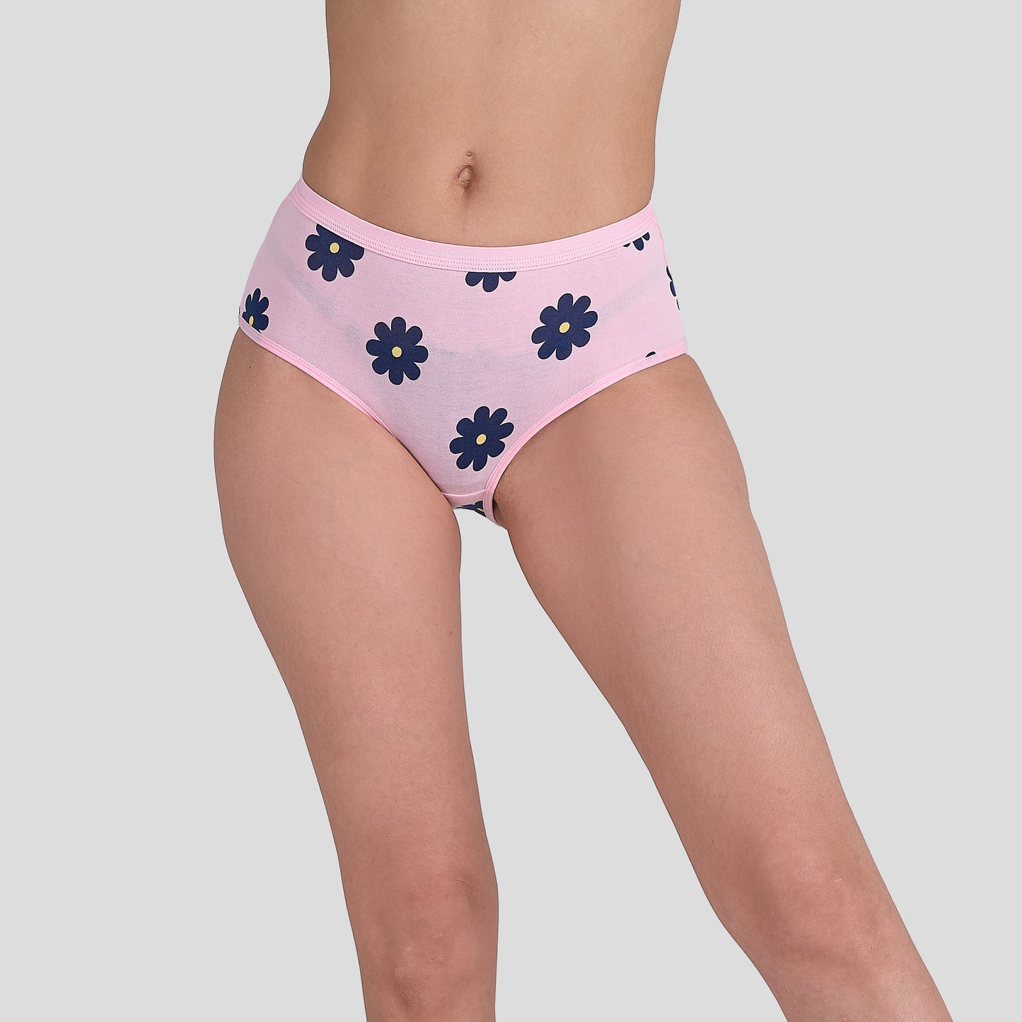 Dice Pink underwear with floral pattern worn by a person on a gray background