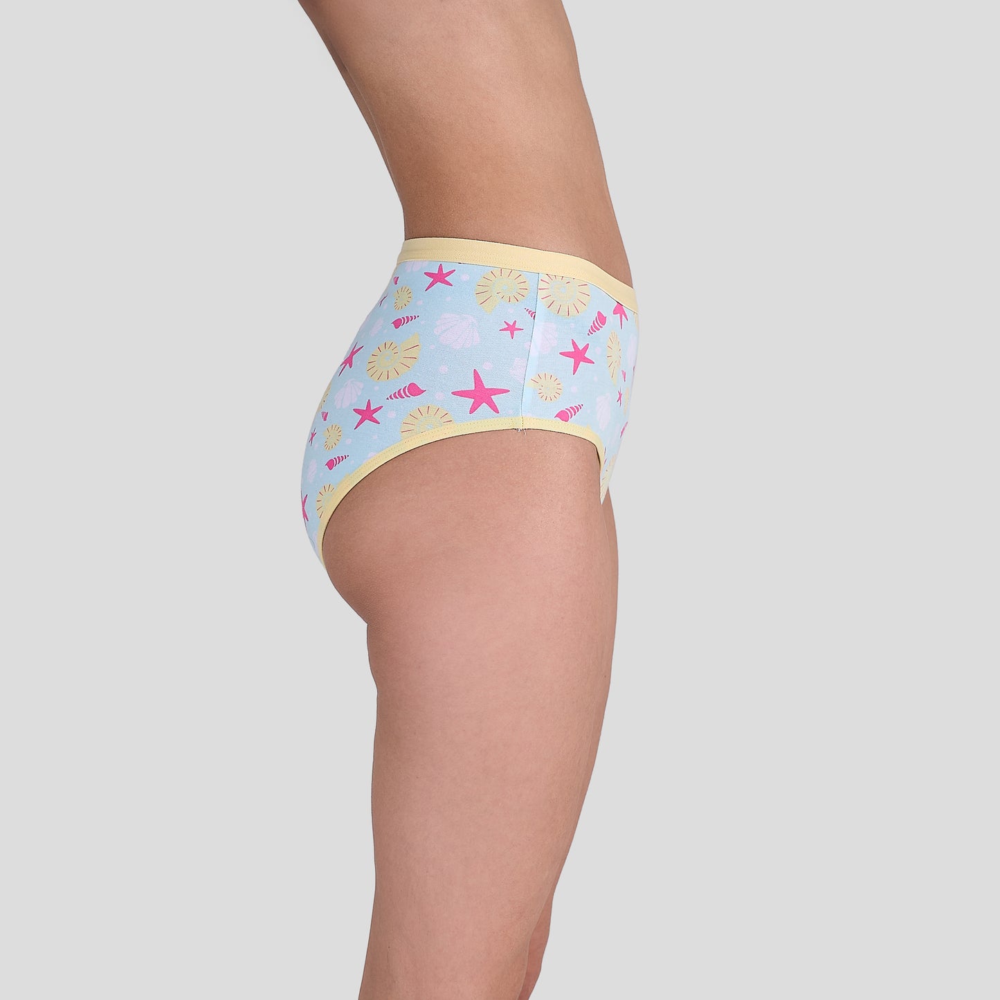 Dice Light blue underwear with starfish pattern on a plain background