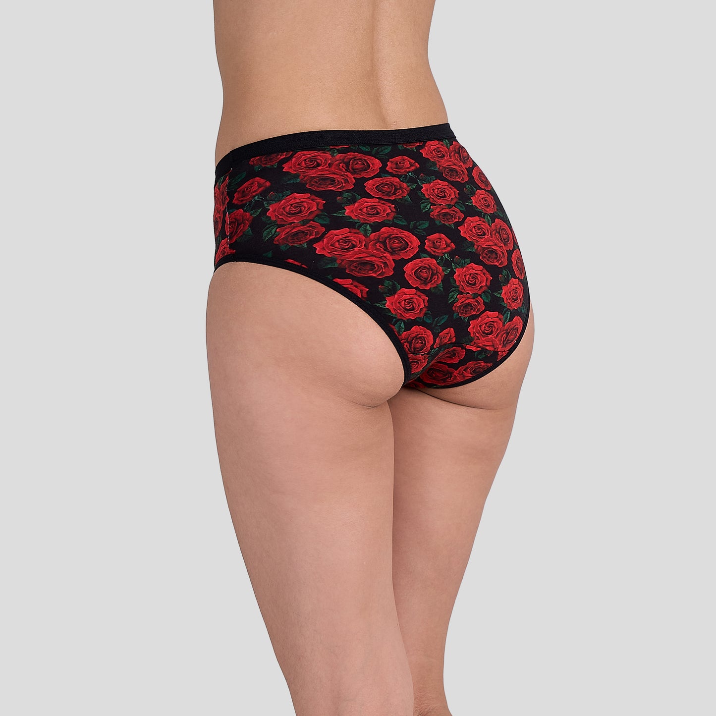 Dice Red rose patterned underwear on a plain background