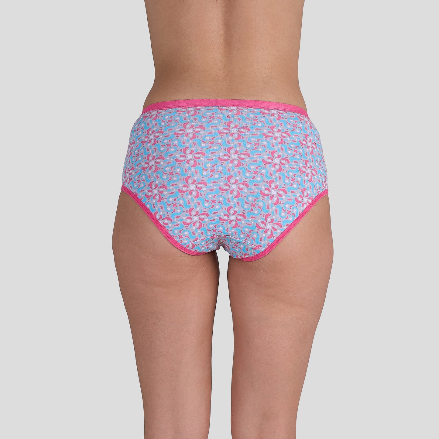 Dice Patterned underwear with pink trim on a plain background