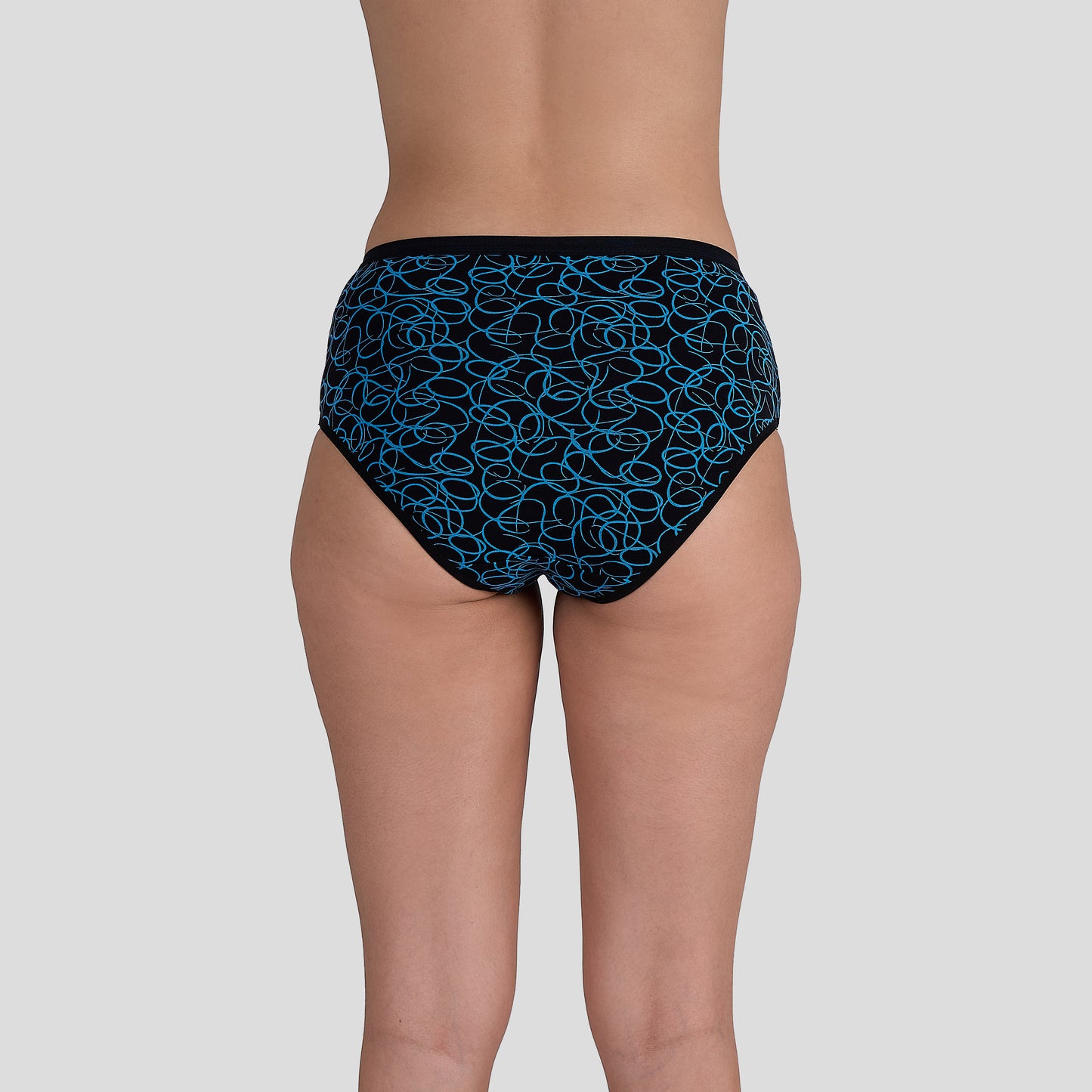 Dice Blue patterned underwear worn by a person on a gray background