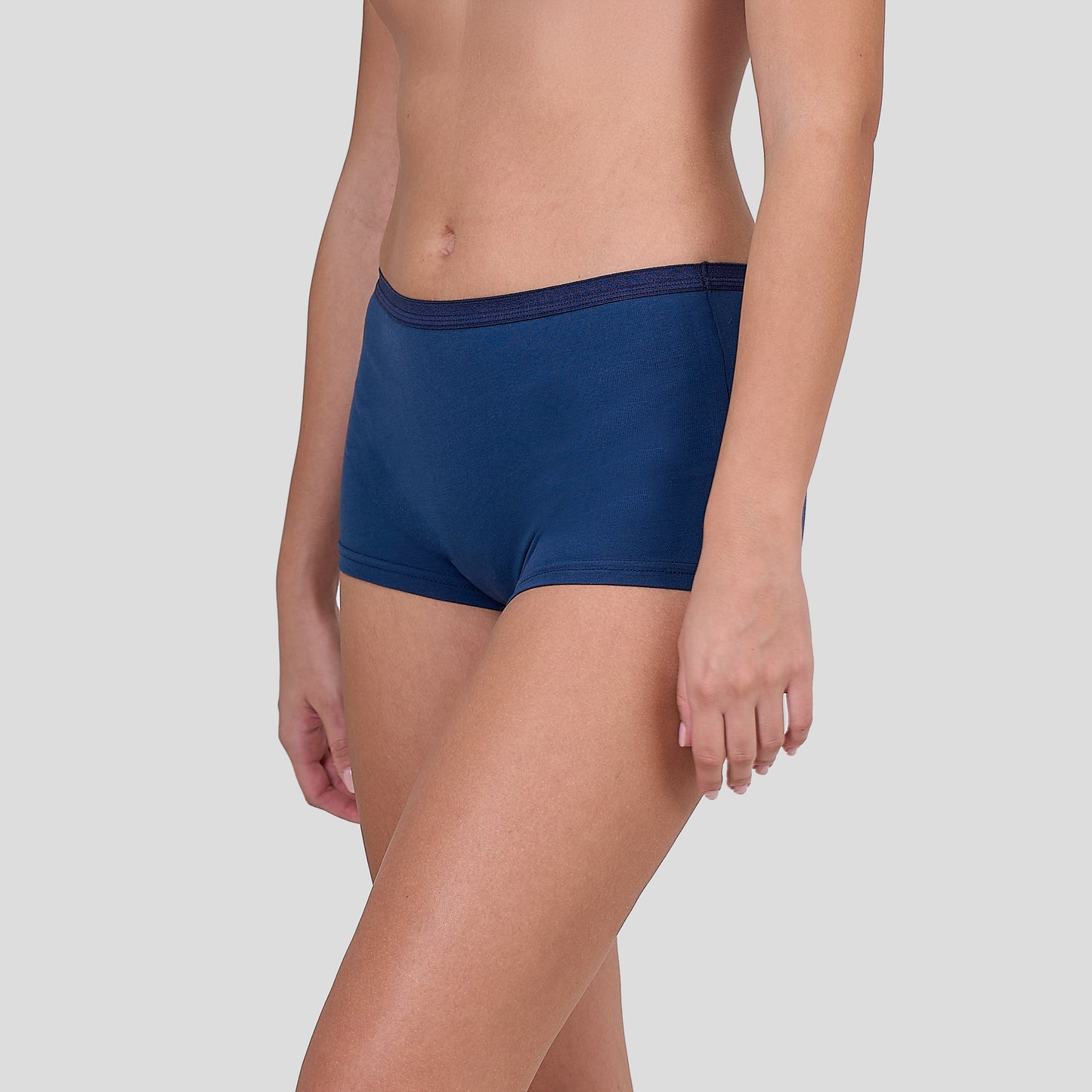 Person wearing a Dice blue underwear on a plain background