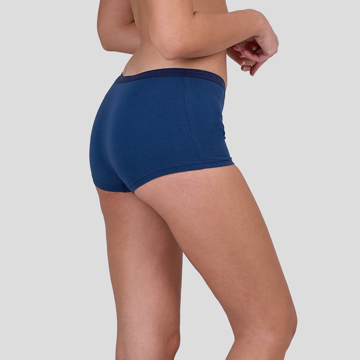 Person wearing a Dice blue underwear on a gray background