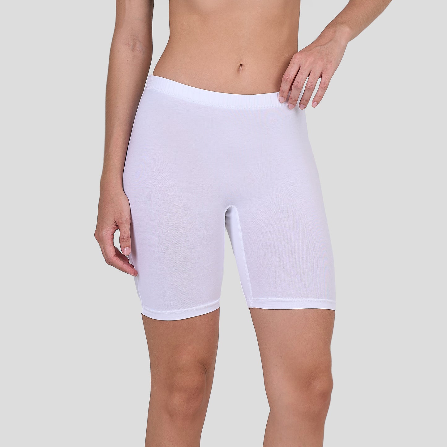 Dice White athletic shorts worn by a person on a plain background