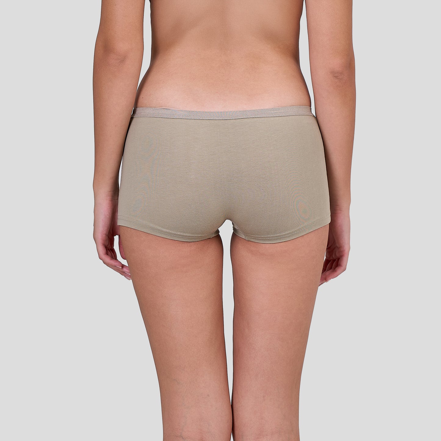 Person wearing Dice beige underwear on a plain background