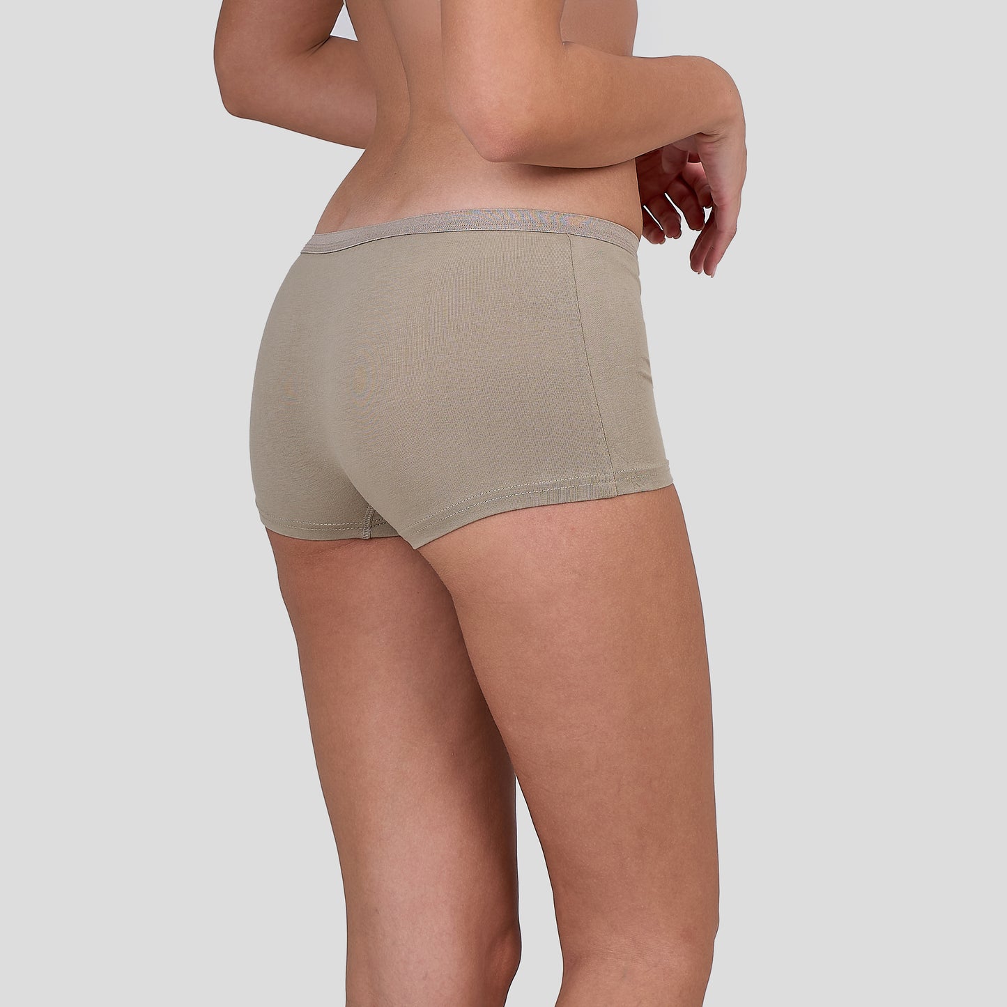 Person wearing a Dice beige underwear on a plain background