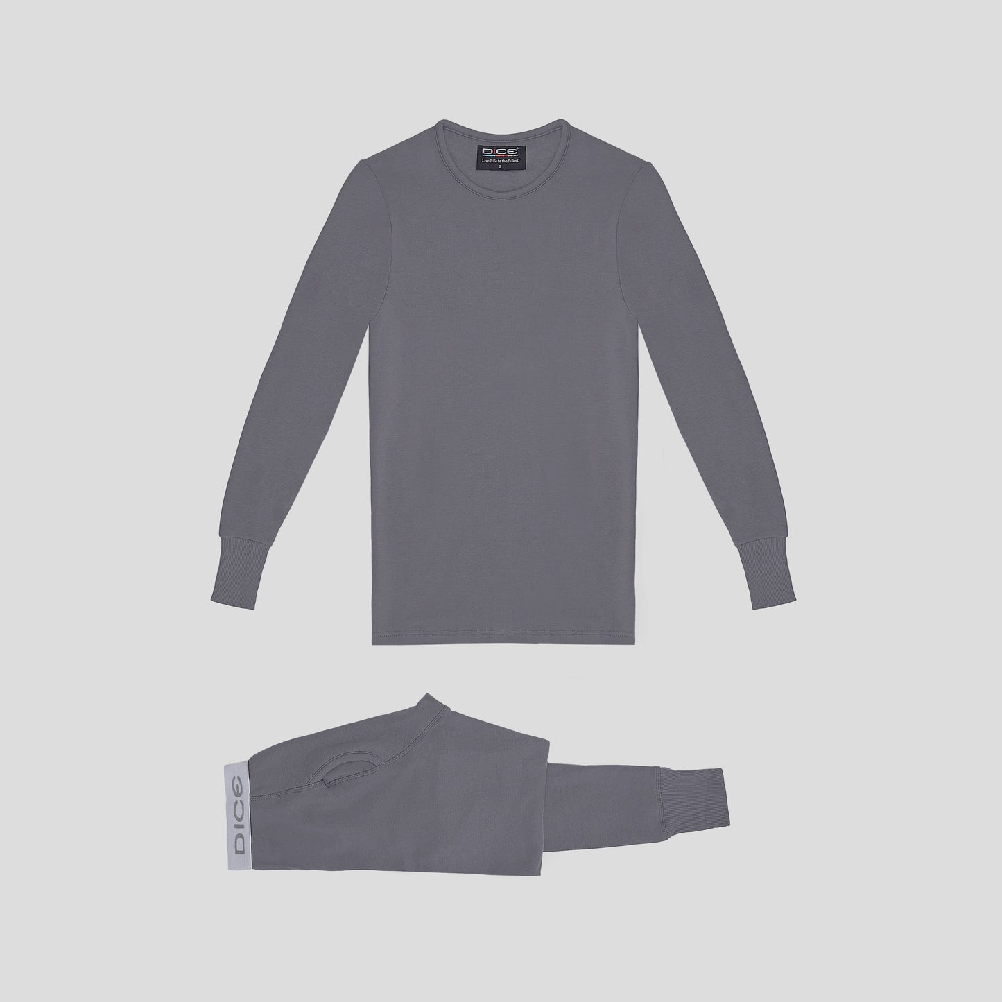 Gray long-sleeve shirt and arm warmer set on a light gray background