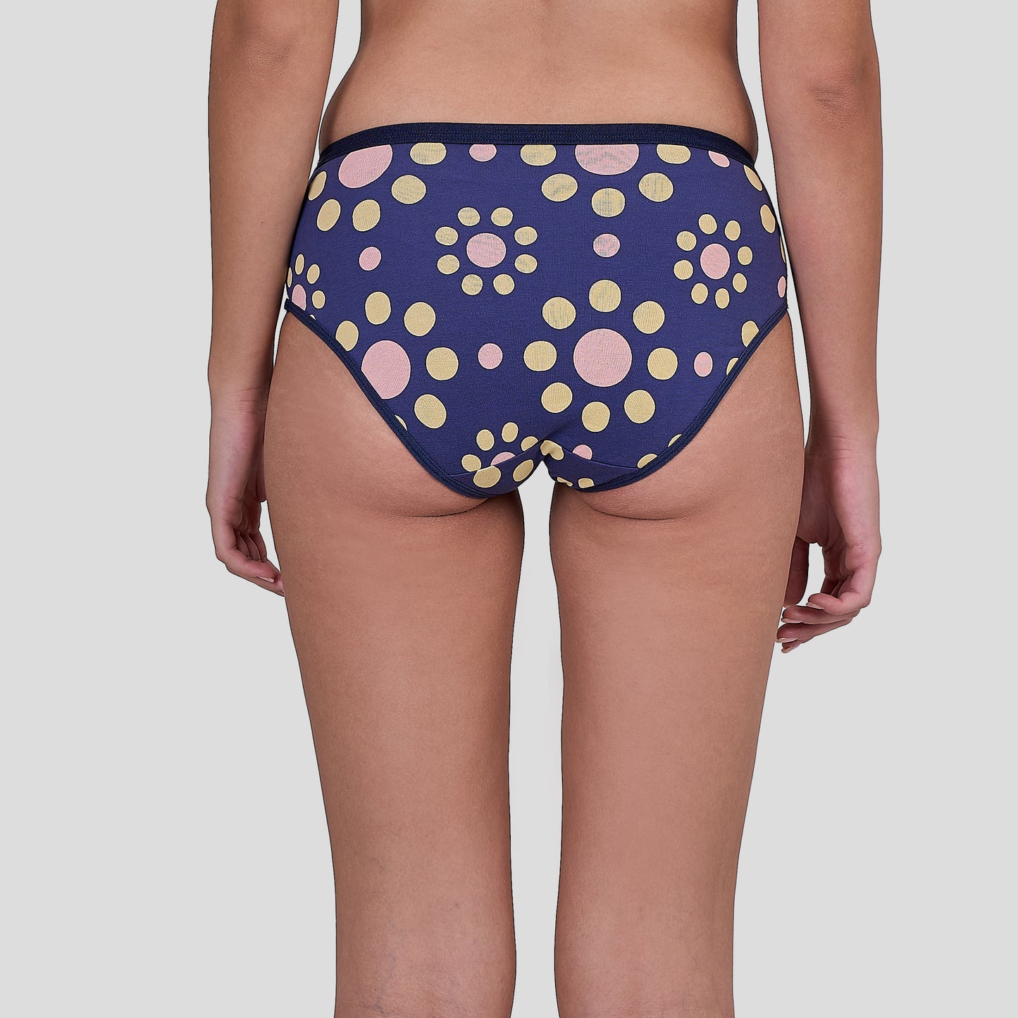 Dice Polka dot underwear on a plain background