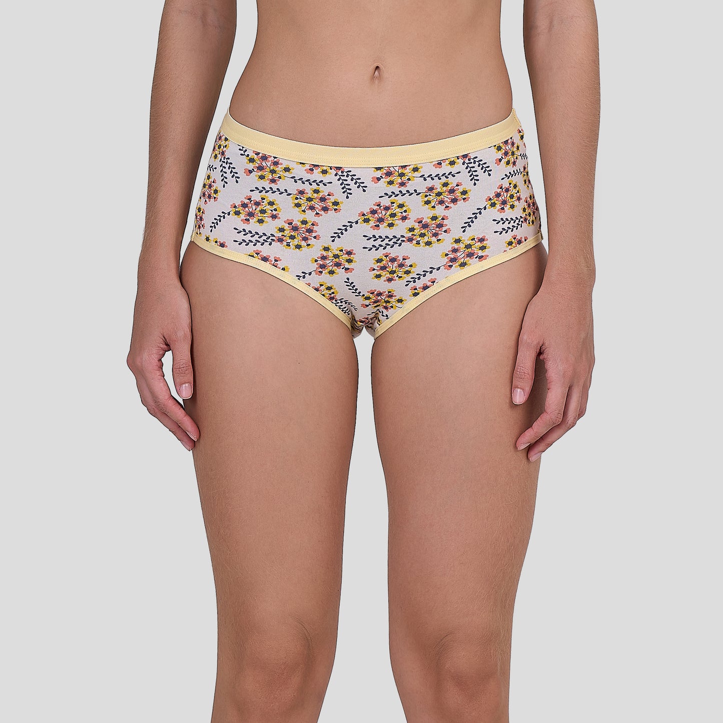 Dice Floral-patterned underwear worn by a person on a plain background