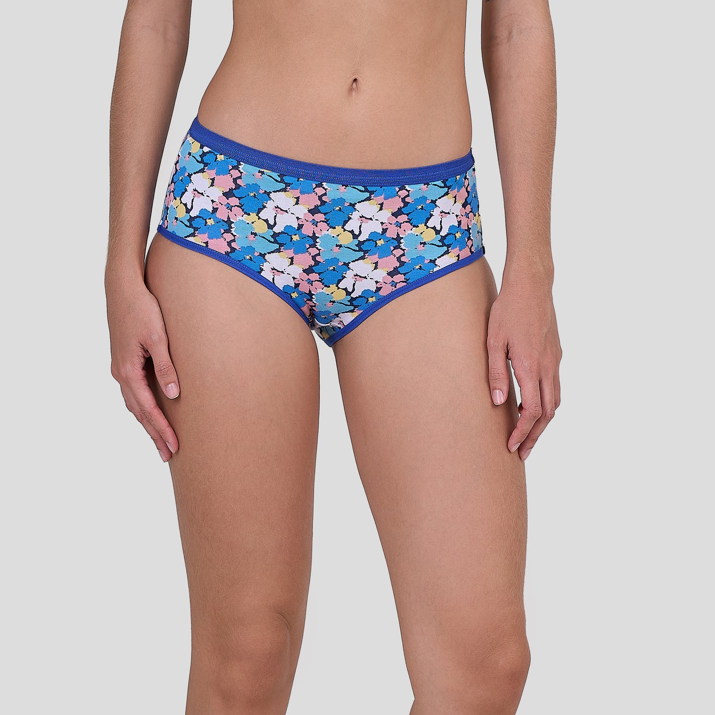 Dice Colorful floral-patterned underwear with blue waistband on a plain background