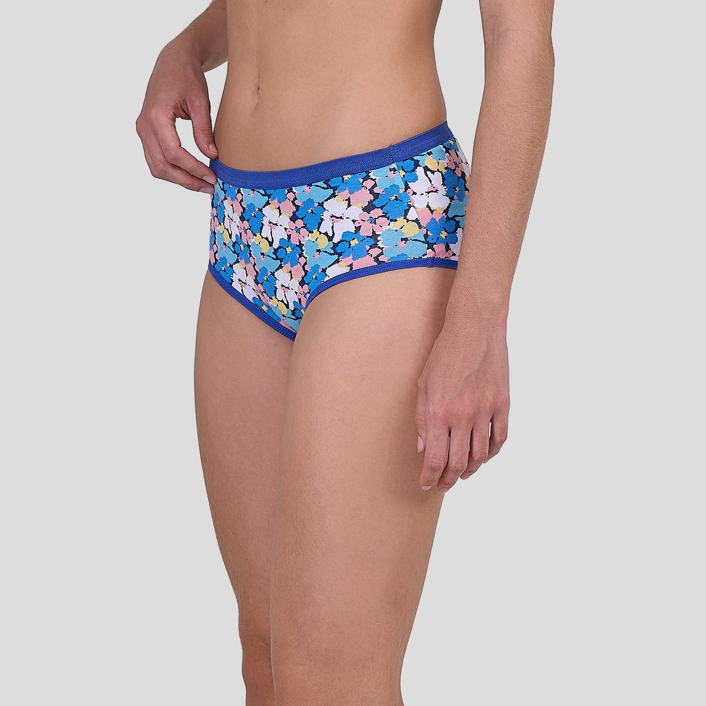 Dice Floral-patterned underwear worn by a person on a plain background
