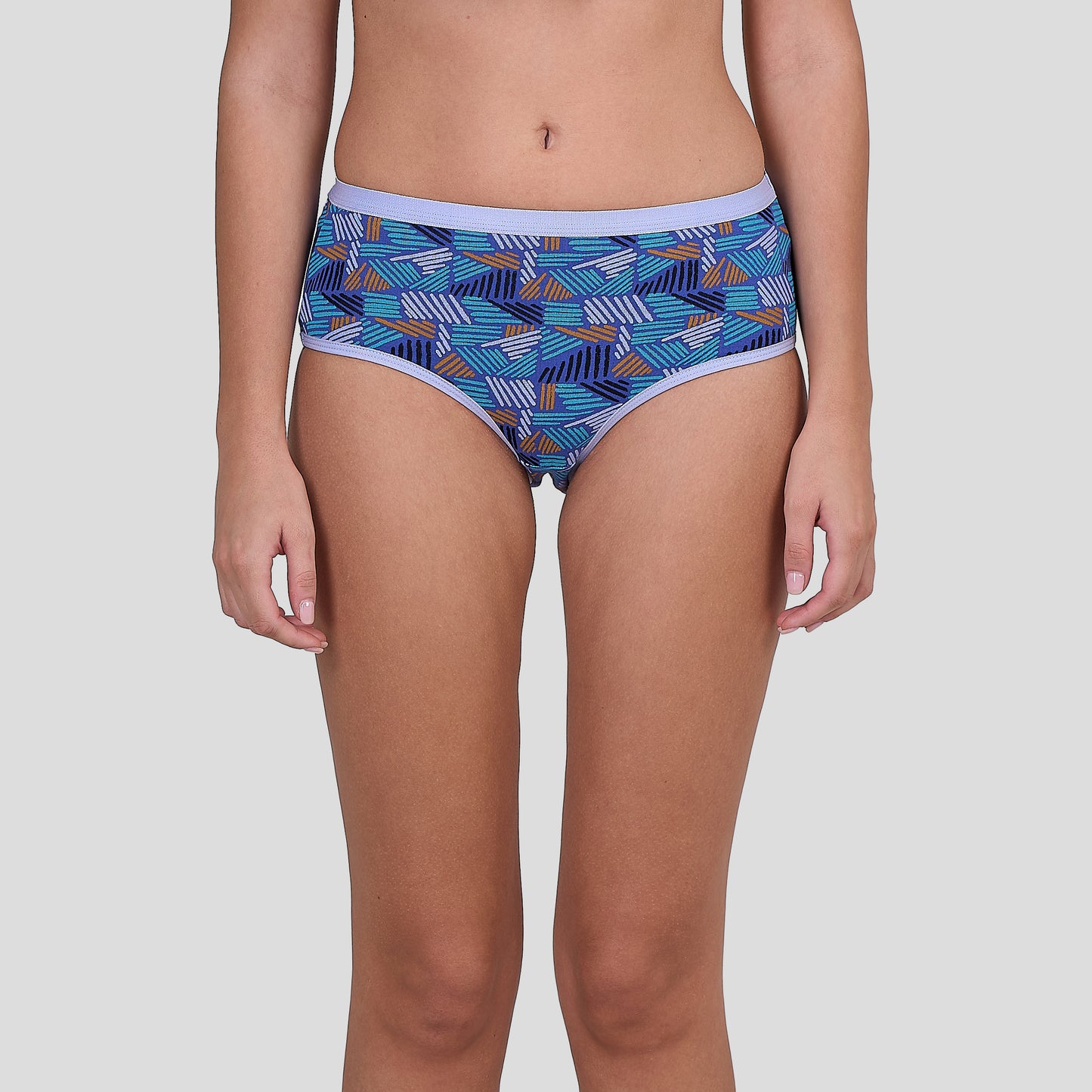 Dice Blue patterned underwear worn by a person on a plain background