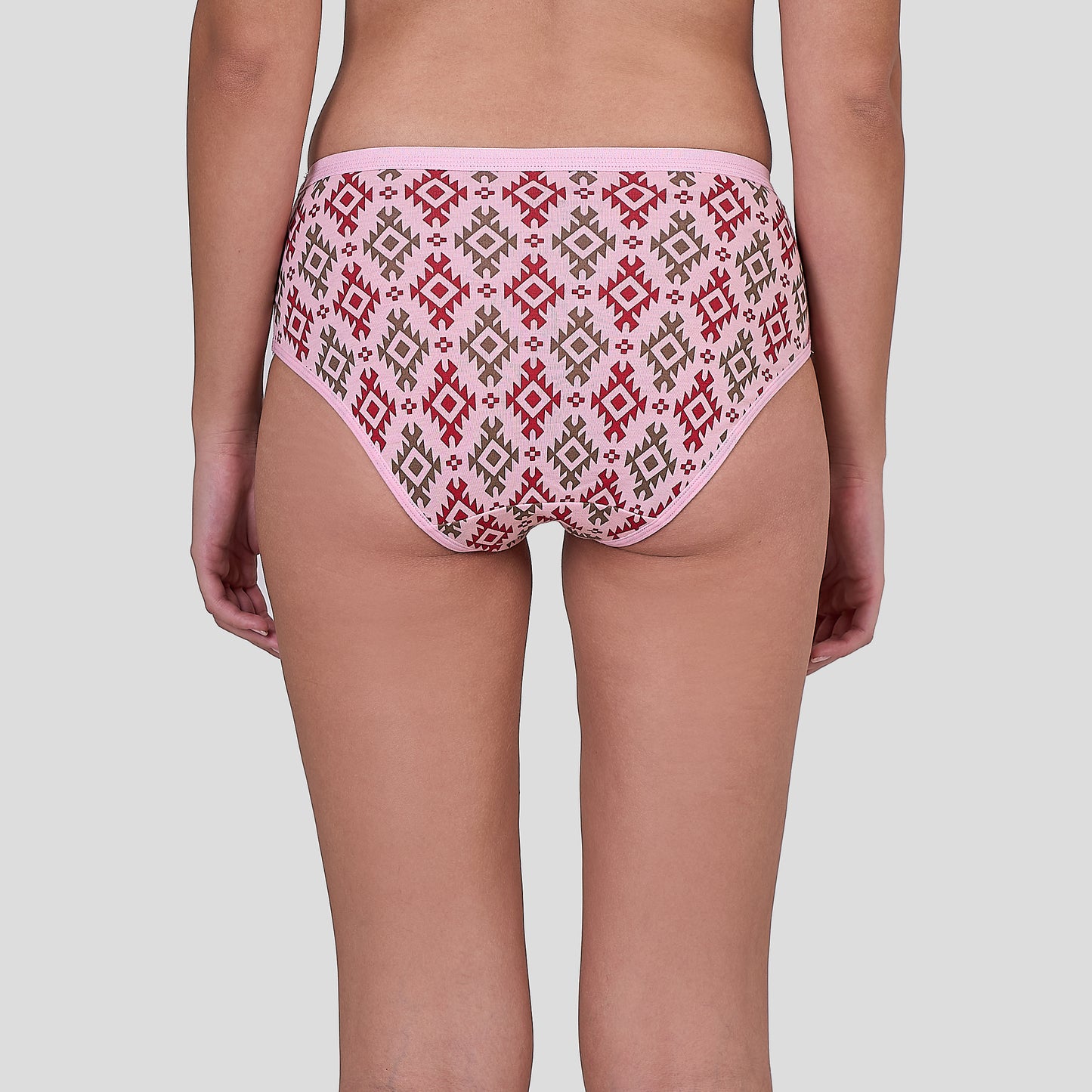 Dice Patterned underwear worn by a person on a plain background
