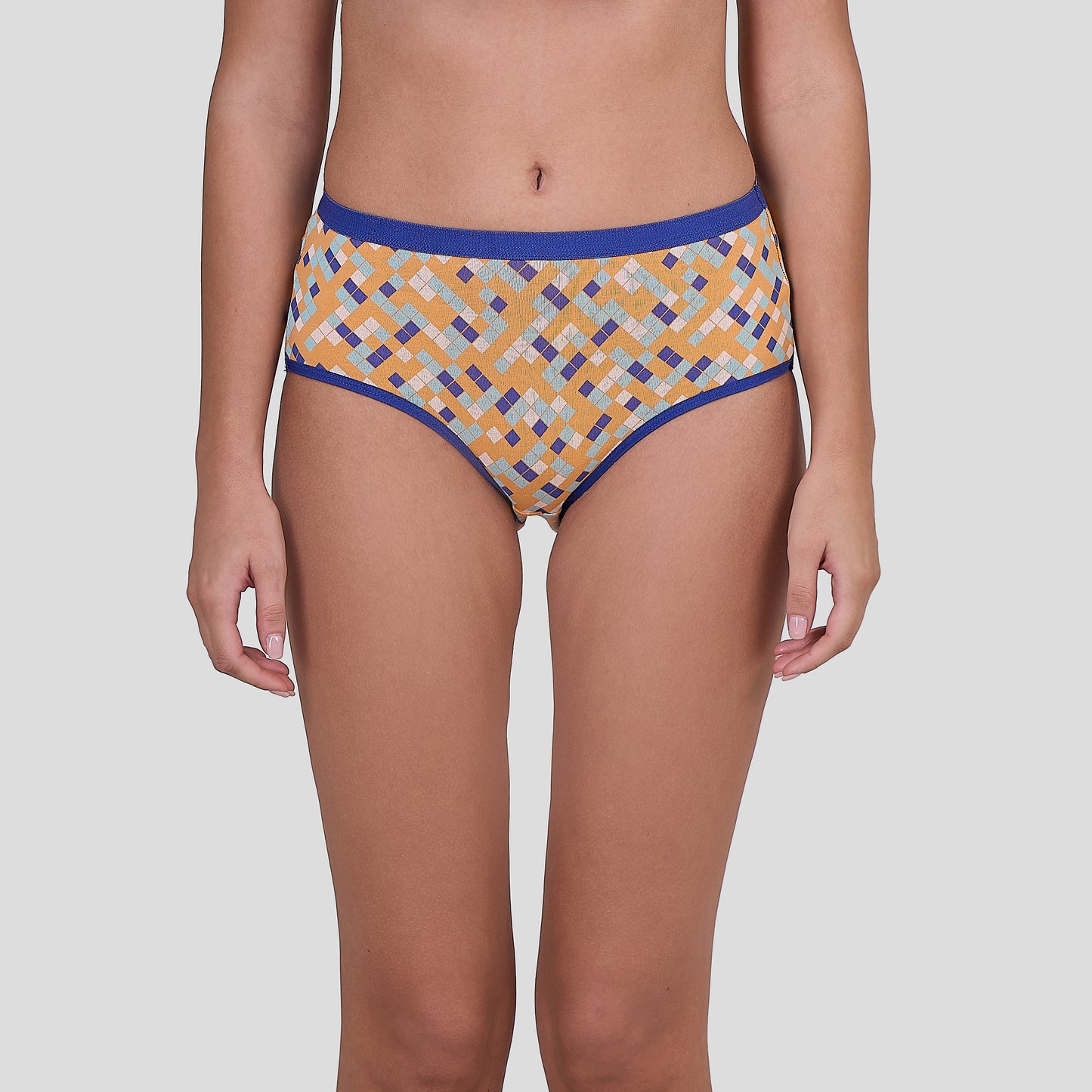 Dice Patterned underwear worn by a person on a plain background