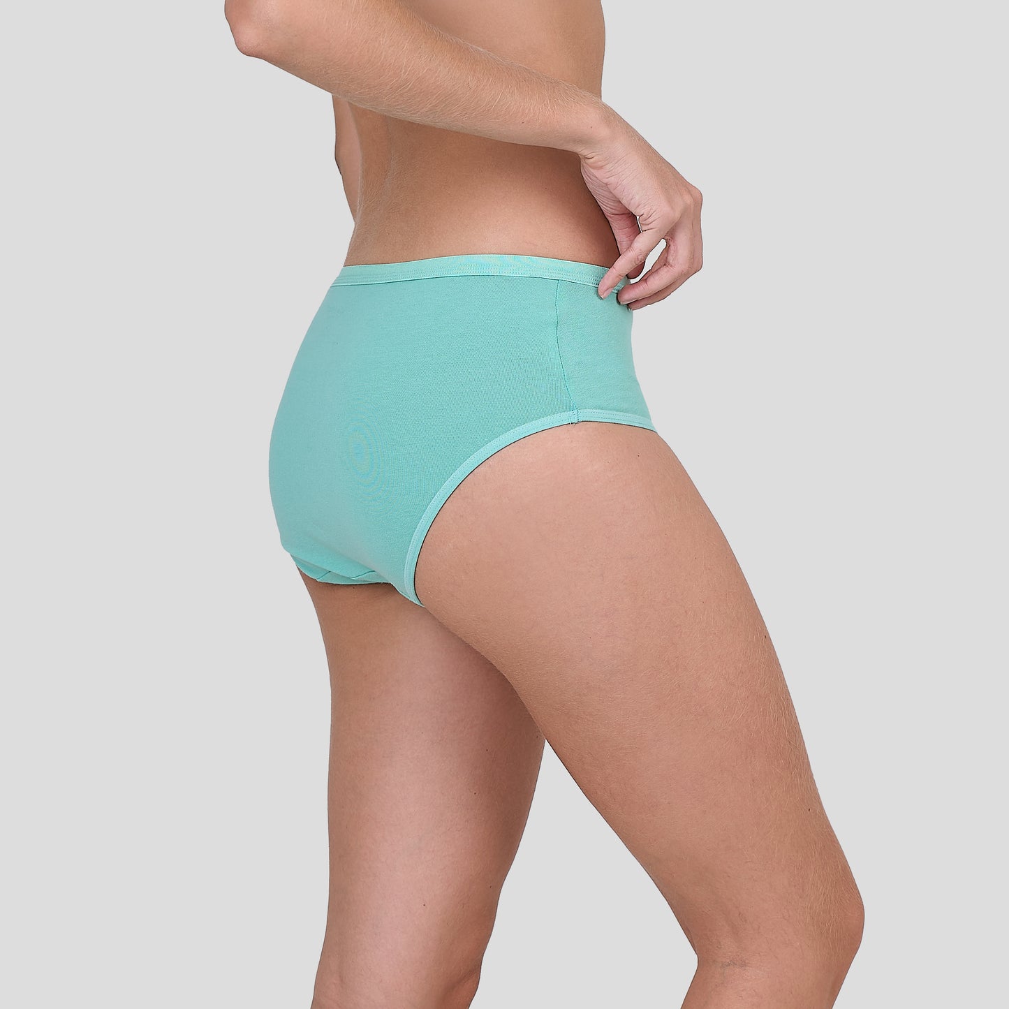 Dice Teal high-waisted underwear worn by a person on a light gray background