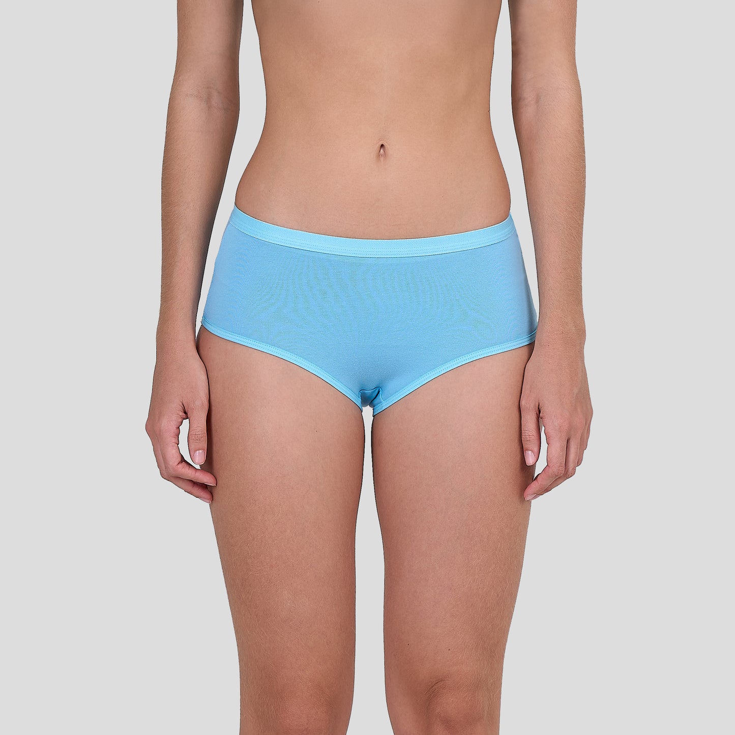 Dice Person wearing light blue underwear on a plain background