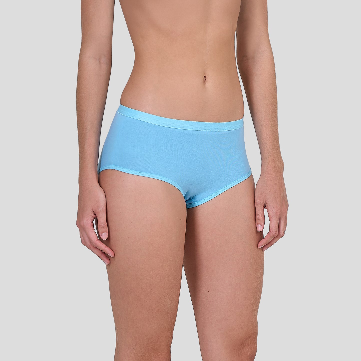 Person wearing Dice light blue underwear on a plain background