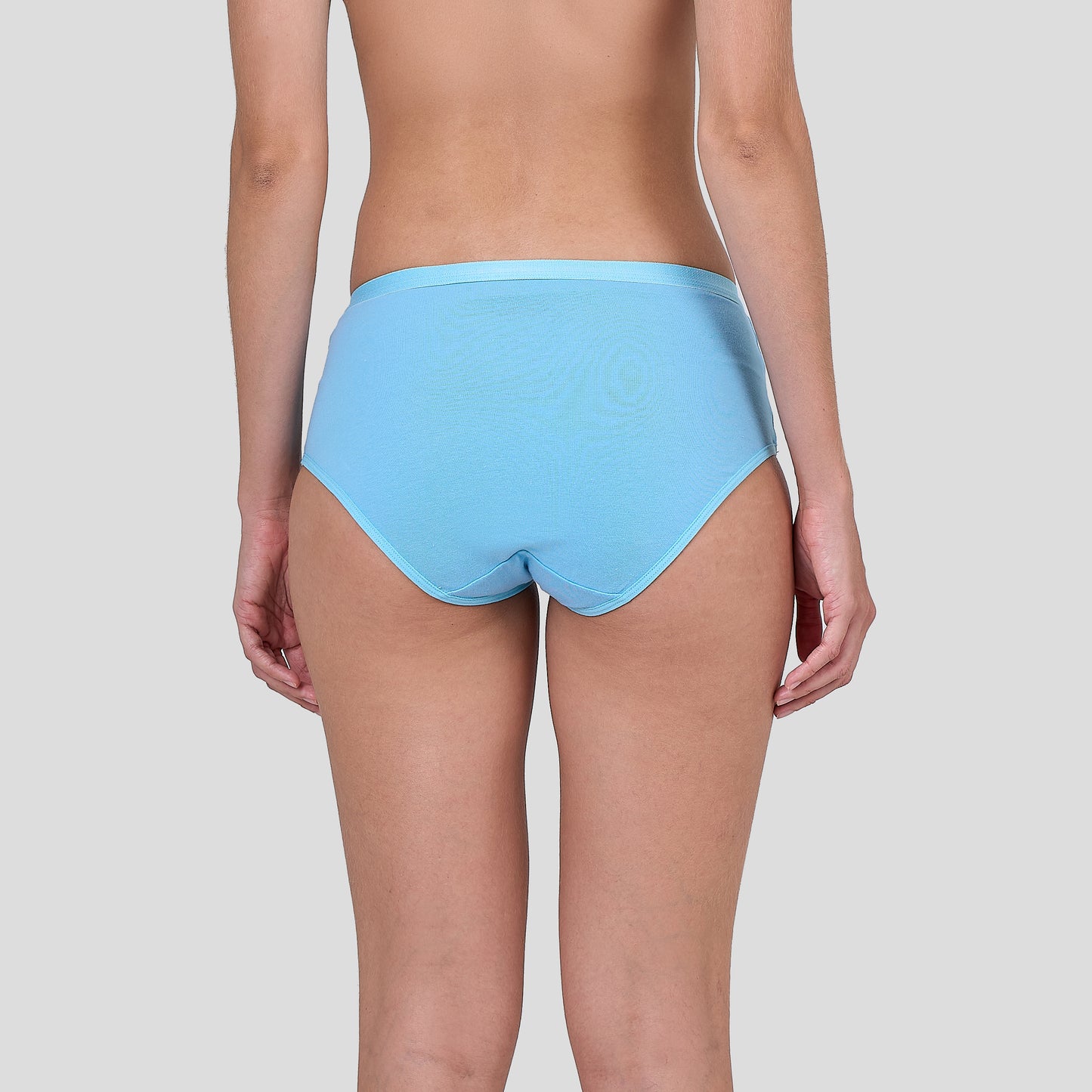 Person wearing Dice light blue underwear on a plain background