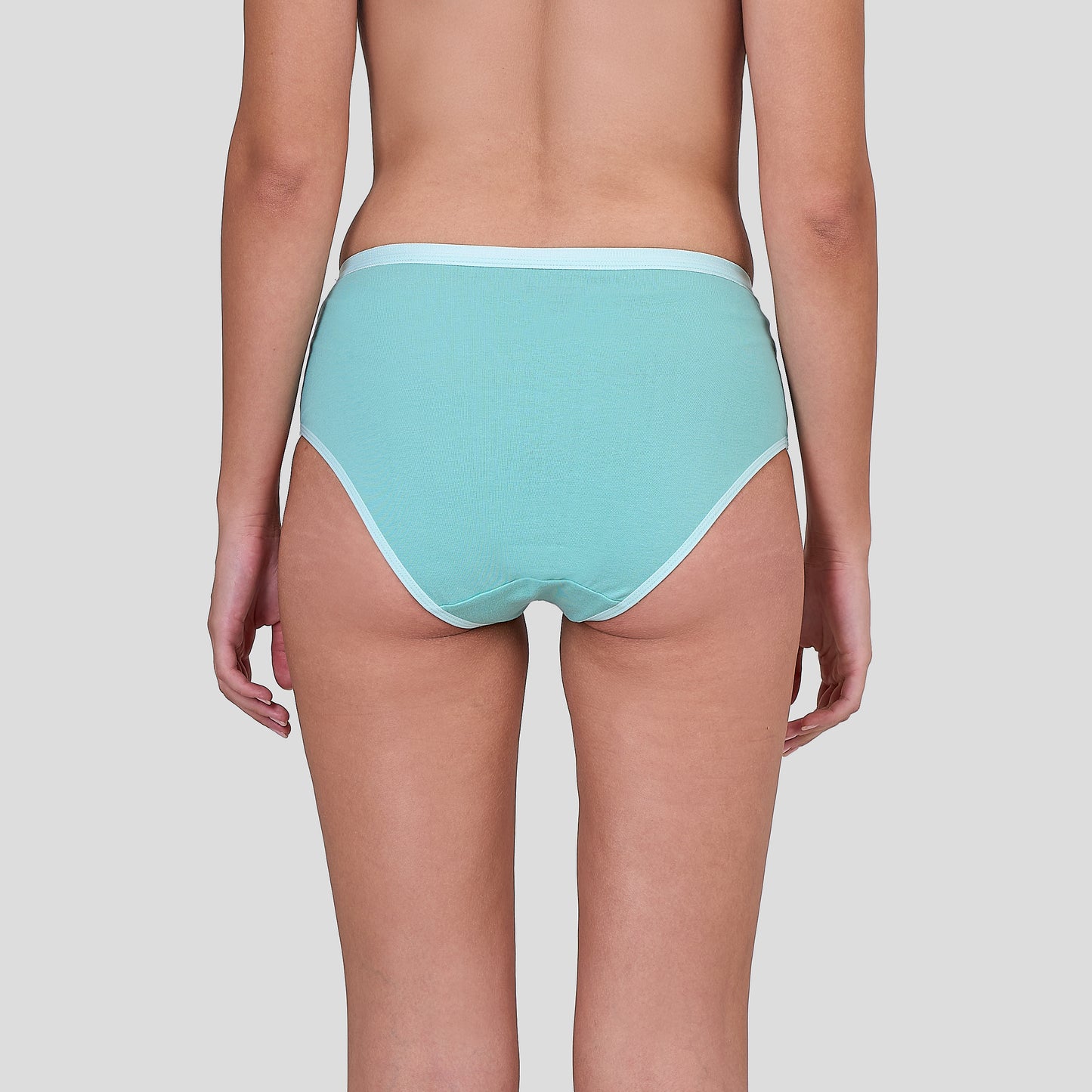 Person wearing a Dice light blue bikini bottom on a plain background