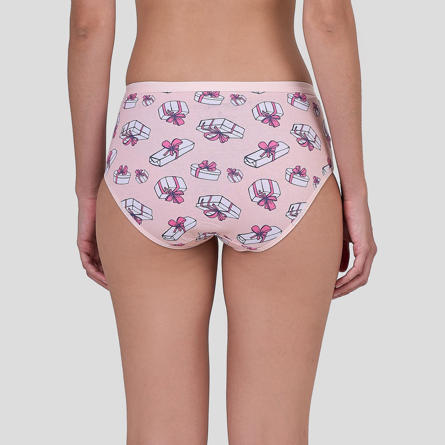 Dice Pink underwear with bow and gift box pattern on a plain background
