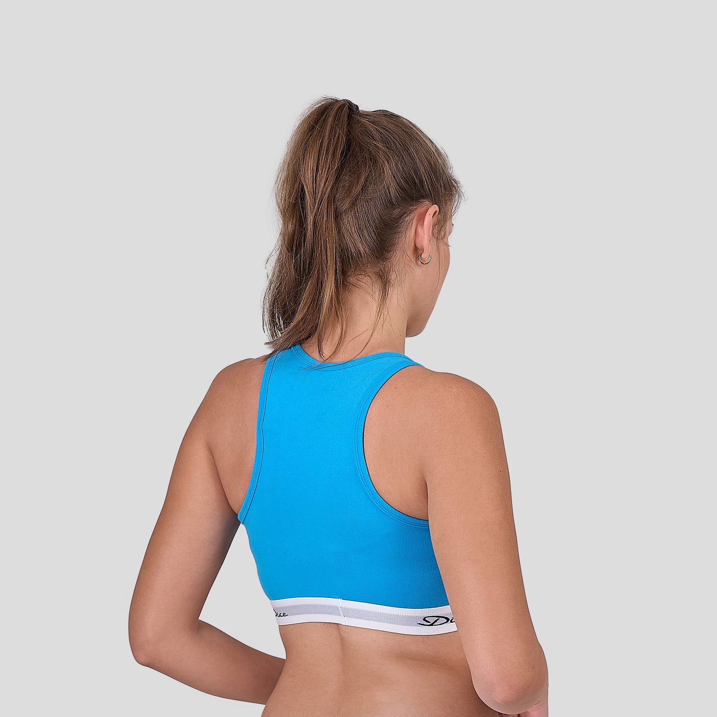 Dice blue sports bra on a plain background