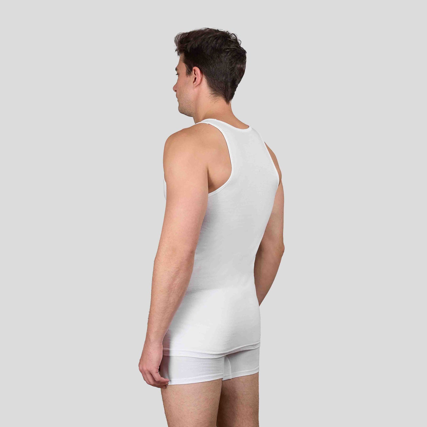 Dice white tank top and shorts on a light gray background