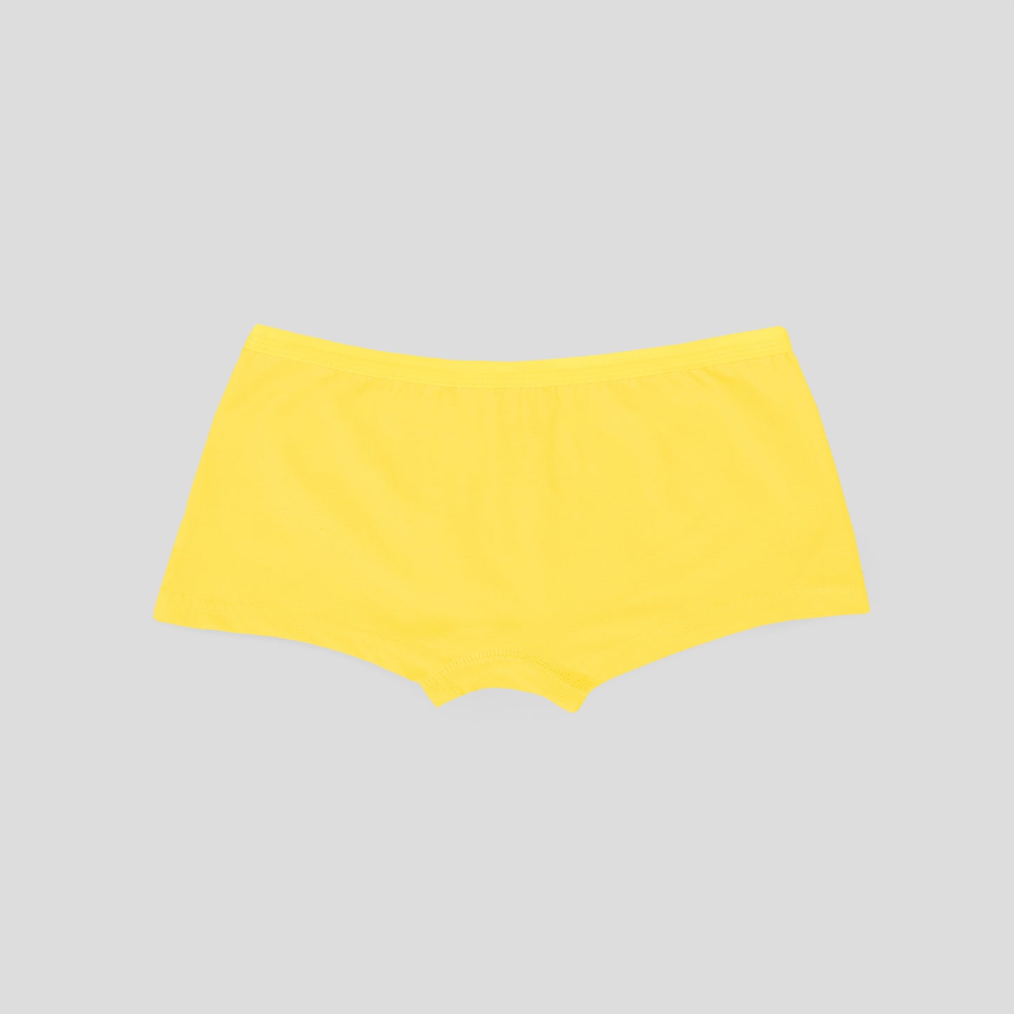 Yellow high-waisted Dice women underwear on a light gray background