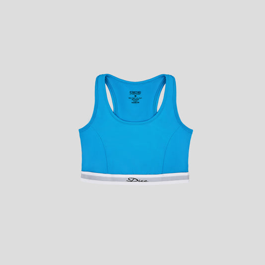 Dice Blue sports bra on a gray background