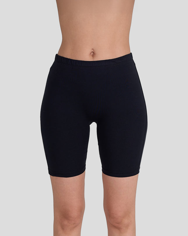 Dice Black shorts worn by a person on a light gray background