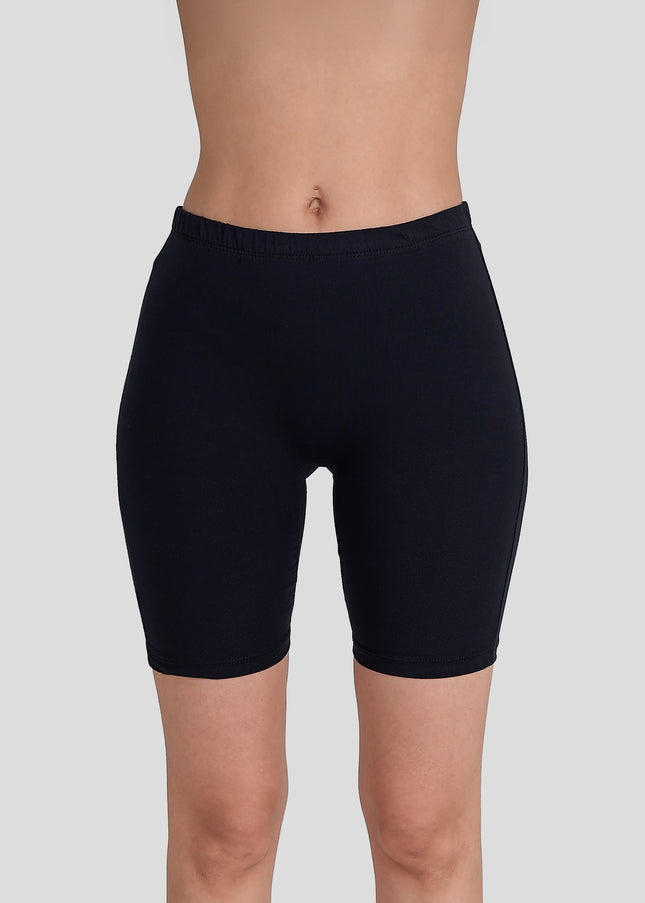 Dice Black shorts worn by a person on a light gray background