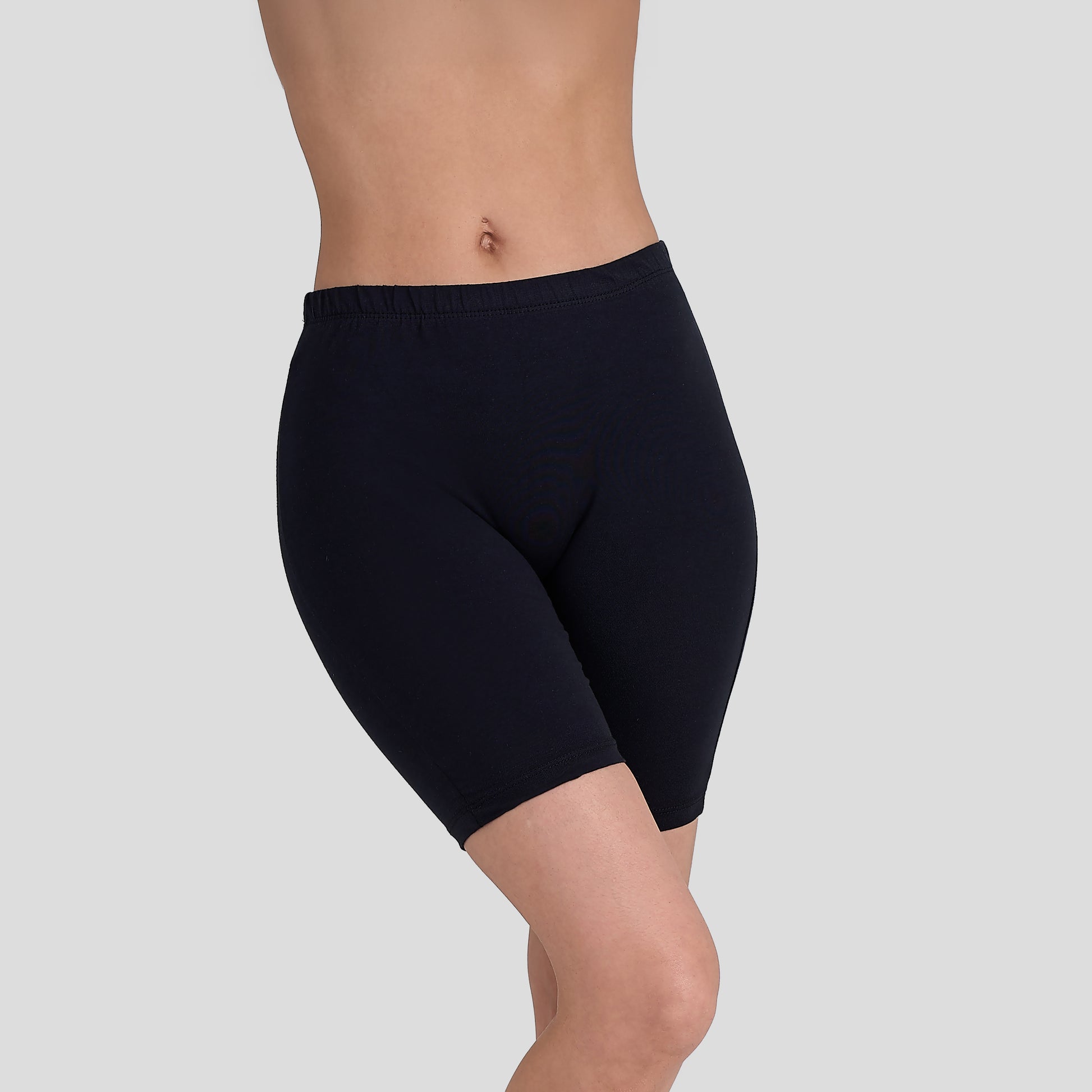 Dice Black shorts worn by a person on a gray background
