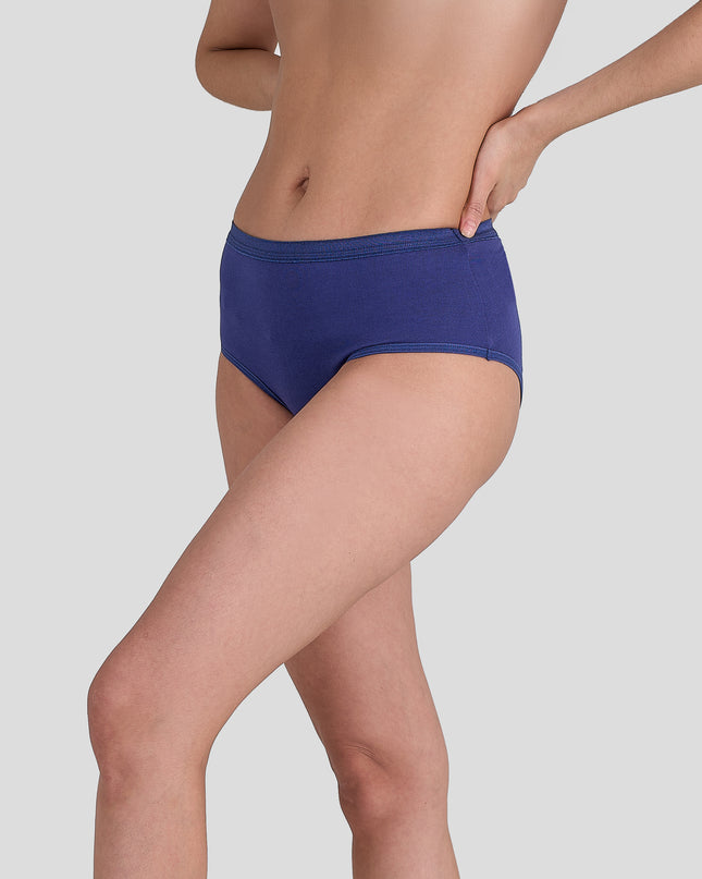 Person wearing a Dice blue underwear on a light gray background