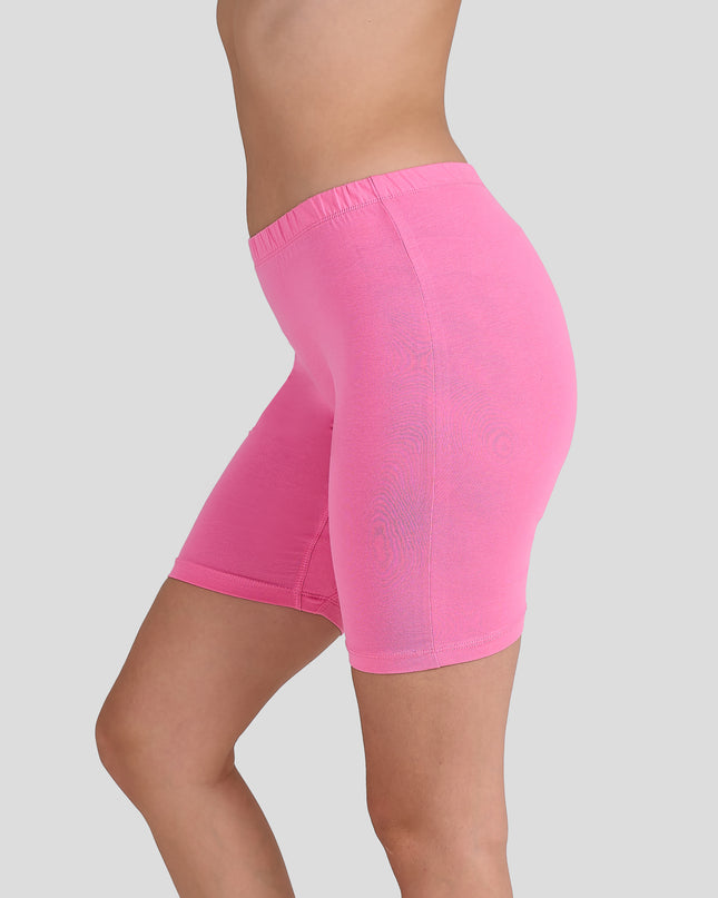 Dice Pink athletic shorts worn by a person on a light gray background