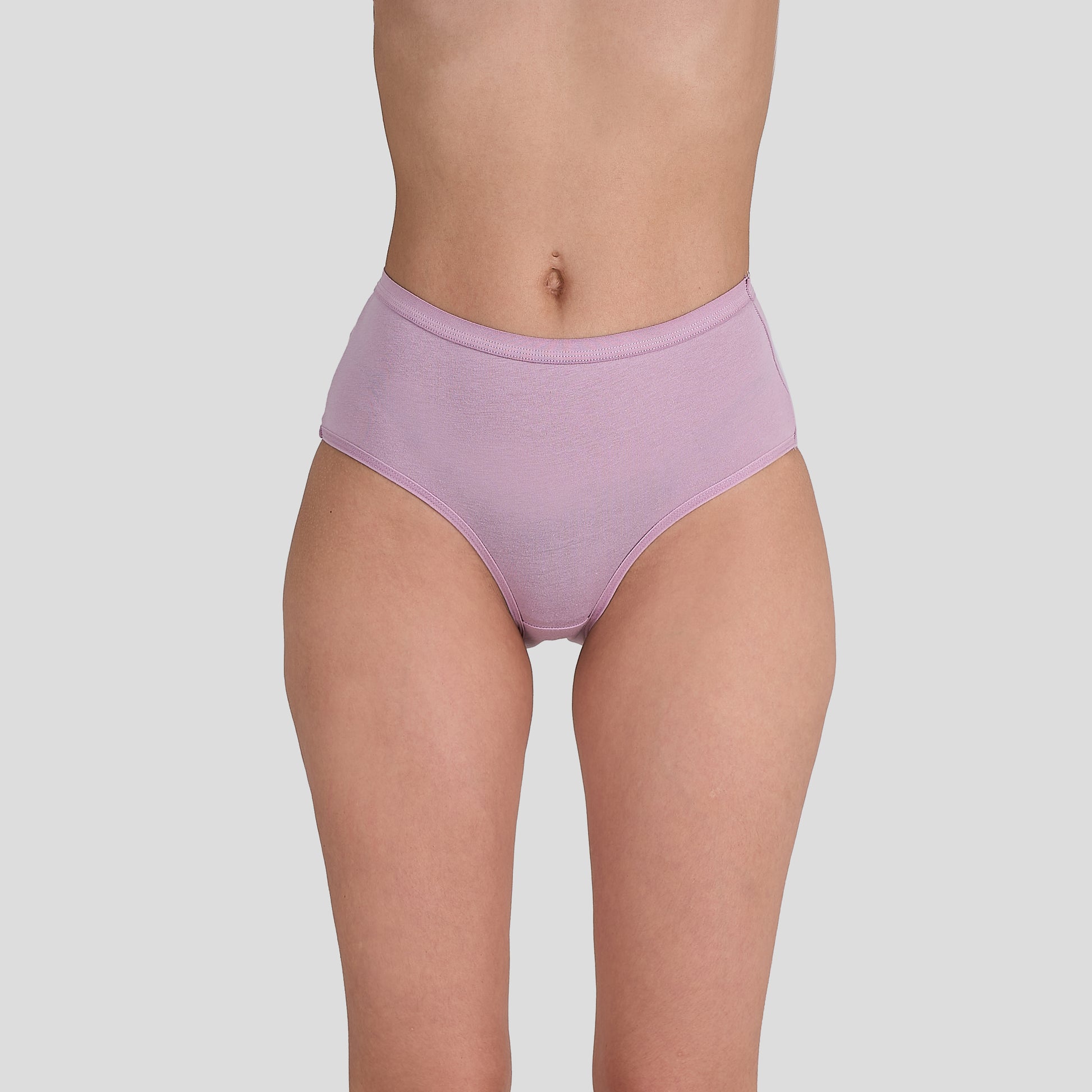 Dice Purple underwear worn by a person on a plain background