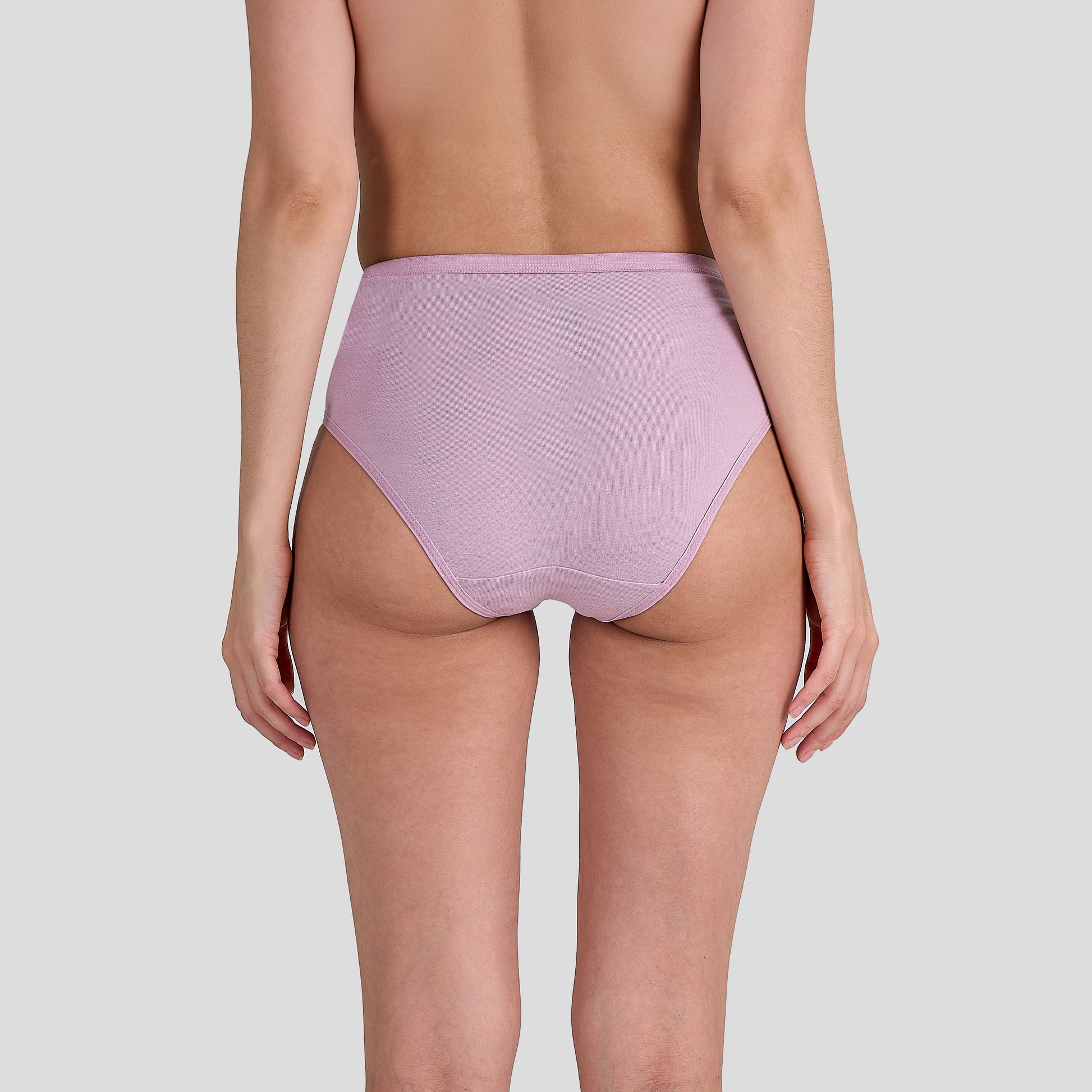Person wearing a Dice light purple high-waisted bikini bottom on a plain background
