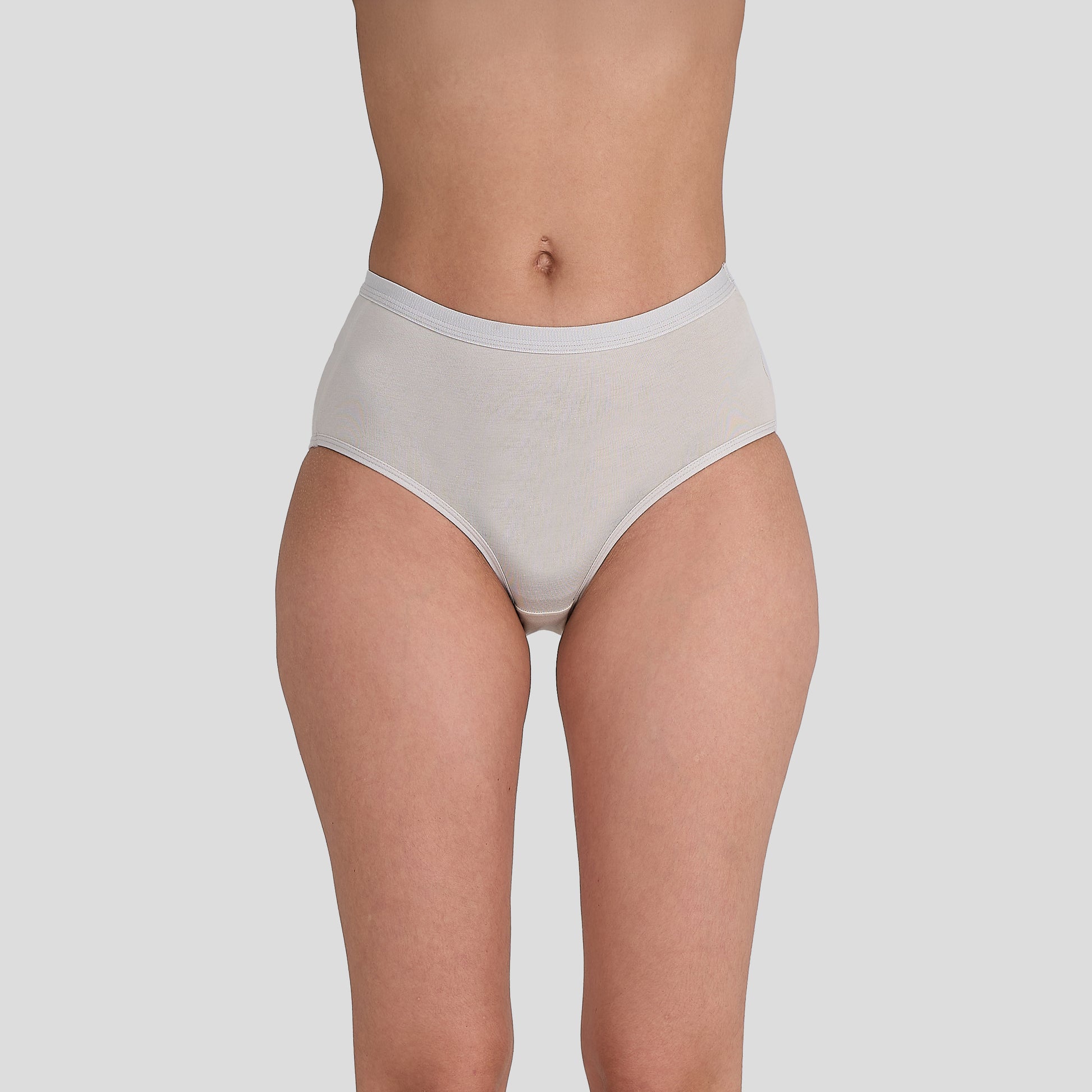 Dice Beige underwear worn by a person on a plain background