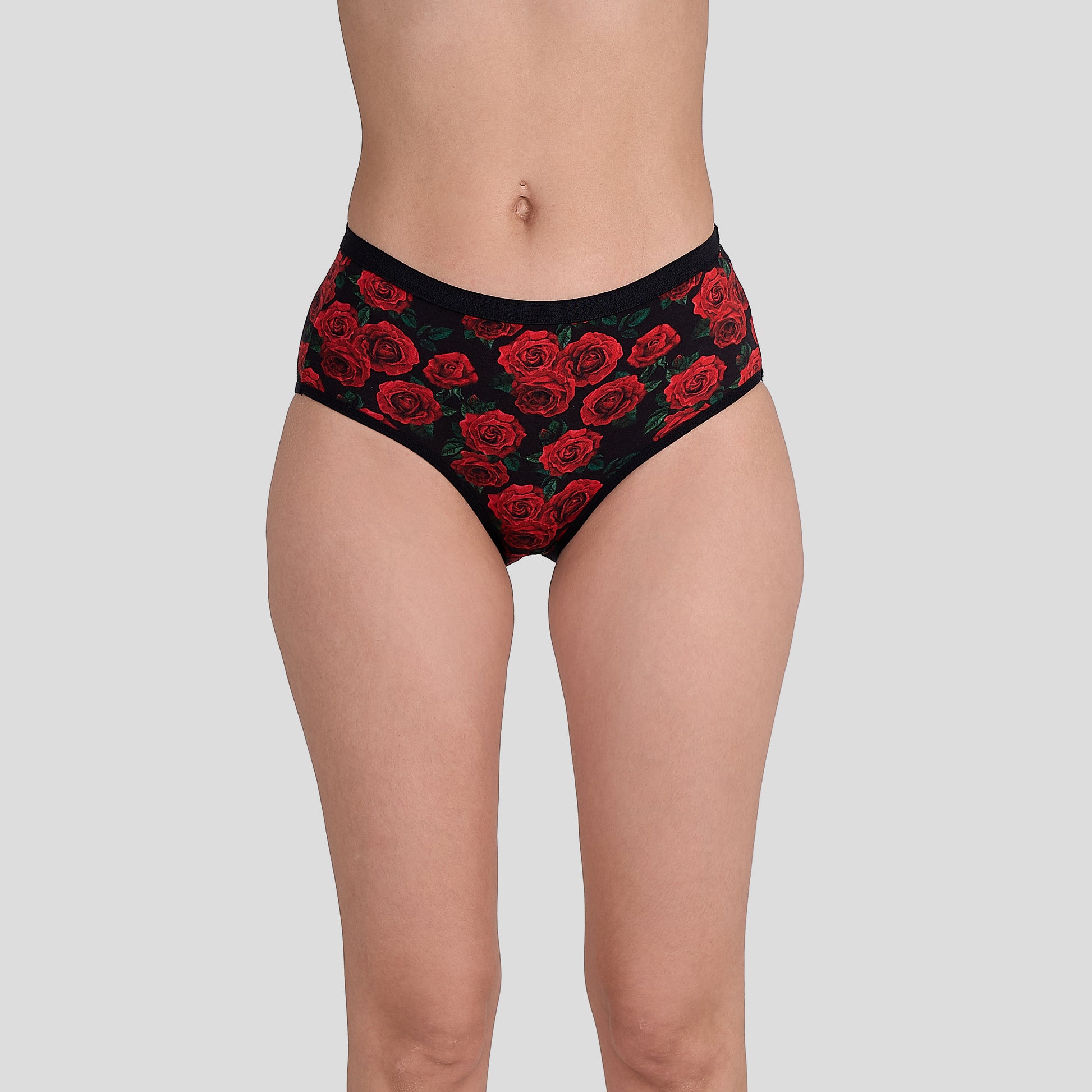 Dice Black underwear with red rose pattern worn by a person on a gray background