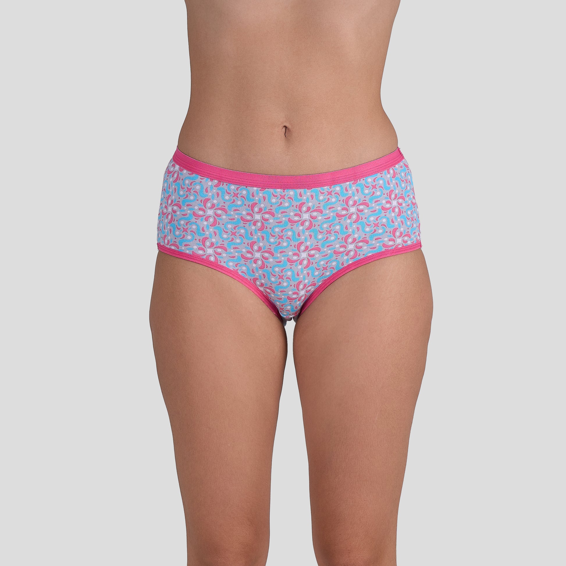 Dice Patterned underwear with pink trim on a plain background