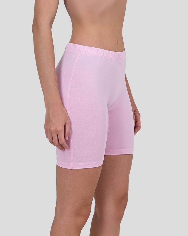Dice Pink athletic shorts worn by a person on a light gray background
