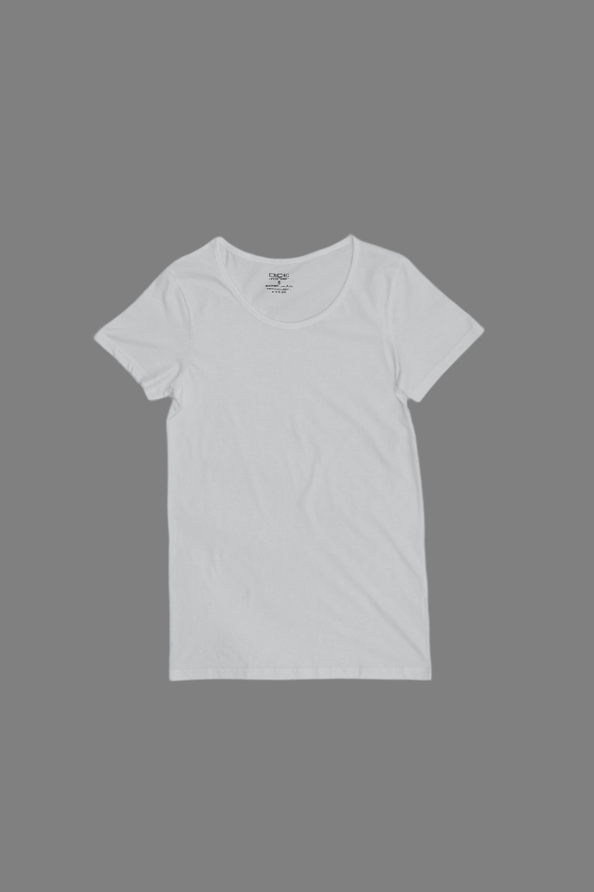 Dice White t-shirt on a gray background with a black measuring tape.