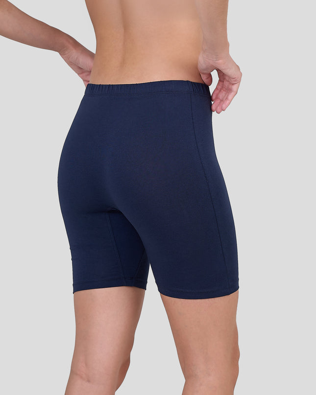 Dice Navy blue athletic shorts worn by a person on a light gray background