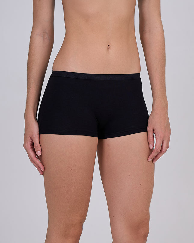 Person wearing a Dice black underwear on a plain background